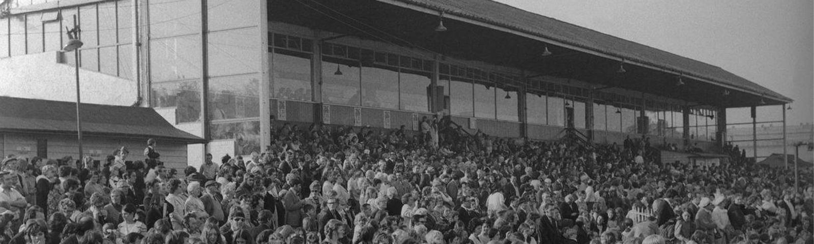 Old black and white photo of the grand stand at Newcastle Racecourse